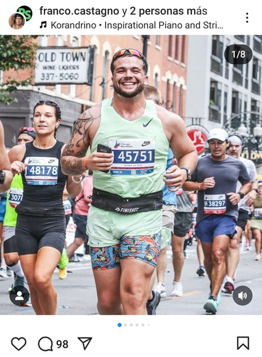 Screenshot of Franco Castagno's Instagram account with a photo of him running in the Chicago Marathon