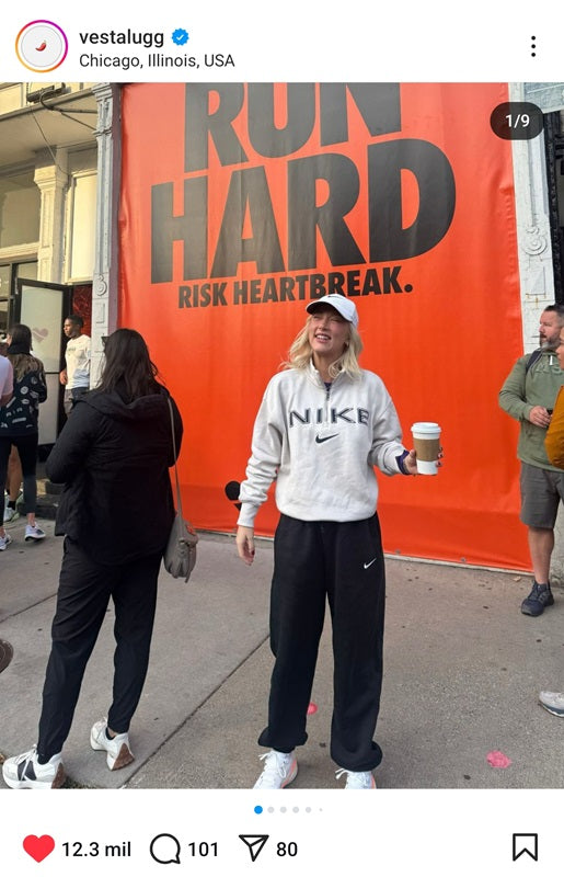 Screenshot of Vesta Lugg's Instagram account with a photo posing in Chicago in front of a Nike advertisement