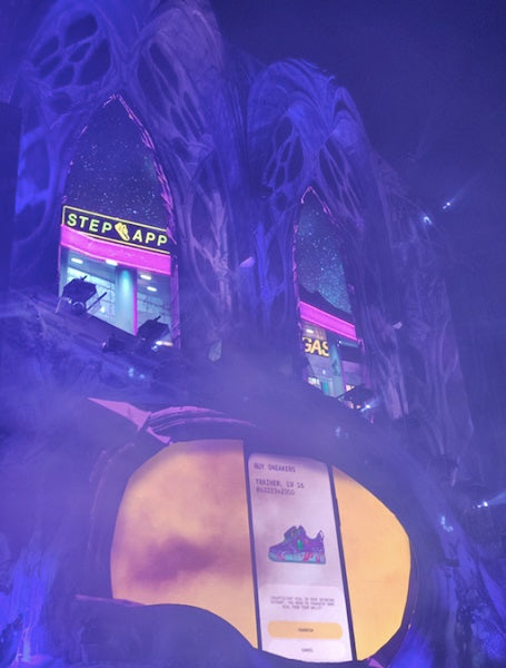 Close-up of the stage showing Step App advertisement