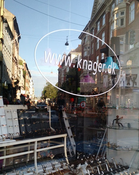 Shop window showing a variety of accessories and the Knager brand.