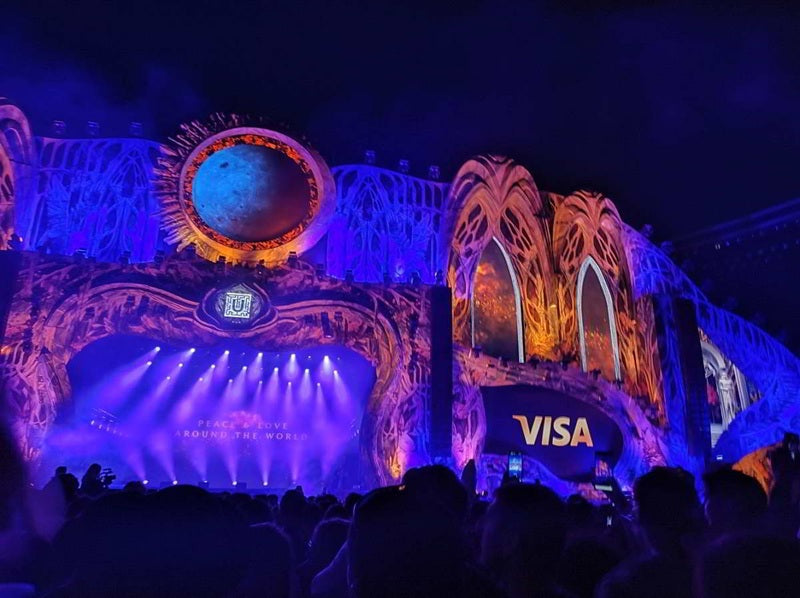 Main stage brightly lit with many blue lights